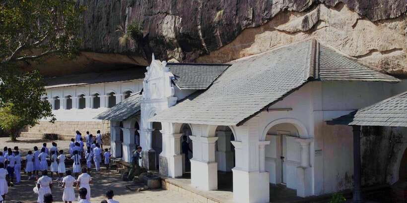 Dambulla: Cave Temple and Village All-Inclusive Tour - Entering Dambulla’s five painted caves
