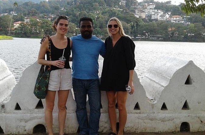 Explore Kandy Full Day Tuk Tuk City Tour - A quiet pause at Kandy War Cemetery