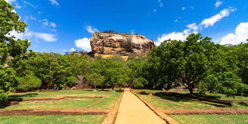 From Kandy: Sigiriya Rock & Dambulla Cave Temple Adventure - Dambulla Cave Temple after the rock climb