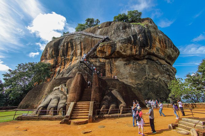 Full Day Tour to Sigiriya & Dambulla from Negombo - Dambulla Cave Temple: painted caves above the town